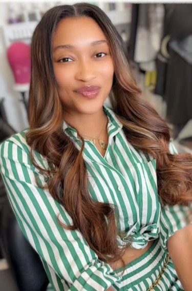 Long layered hair styled at The Plug